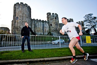 Cartrefi Conwy's Kevin Talbot gets ready for the half marathon watched by organiser Chris Yorke.