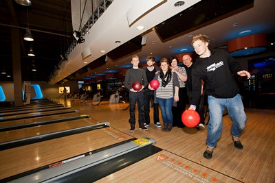 Wrexham students are planning a charity Tenpin bowling evening next month at Tenpin at Eagles Meadow next month. James Yarwood bowls watched by, from left, Ryan Harvey, Adam Fuller, Emma Louise Humphreys, Janet Masters, sales manager at Tenpin and Robbie Newby, front of house technician.