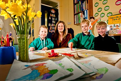 Meinir Thomas Jones from Coleg Harlech at Nannerch School. Meinir with pupils from left, Lucy Caldwell, 4, Aidan Rothwell-Jones and Simon Jackson, 5.