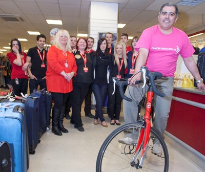Charlie Esfandiarinia
with his partner Vanessa Morgan, front left and other ,e,bers of staff a TK Maxx in the Darwin Centre in Shrewsbury ready for teir big charity fundraising effort.