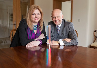 Mario Kreft with artist in residence Sarah Edwards with the Art in Busness award.