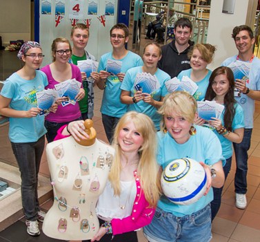 Summer of a Lifetime students outside the pop up shop in the Darwin Centre, Shrewsbury. Hollie Corcoran-Bradbury, front left andRebecca Robinson with other students