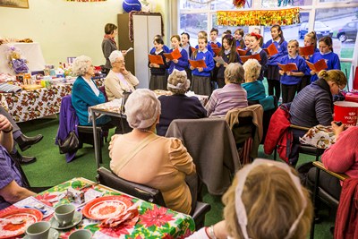 Cartrefi Conwy tenants at the Y Fron Community Centre Xmas party. Pupils from Ysgol Iau Hen Golwyn choir who sanf for the tenants.