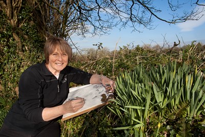 North Wales Open Studios Project , print maker Eirian Llwyd. Pictured is Eirian Llwyd sketching a design.