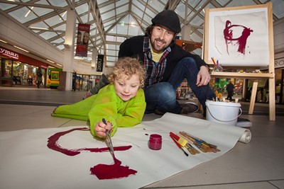 Shrewsbury shopping centre Pride Hill. Pictured is Ember  Wright aged 3 with Chris Wright who will be holding an arts workshop for half term in Pride Hill