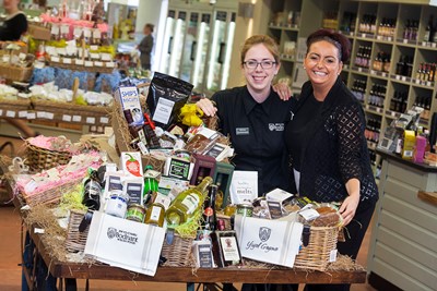 Bodnant foods .. Pictured with the Hampers is Gemma Williams and Becky Williams.