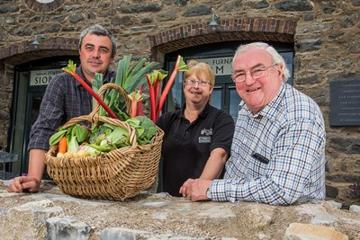 Janet Chadwick from Bodnant Welsh Food Centre with Medwyn Williams and his some Alwyn with some of the produce he will be supplying.