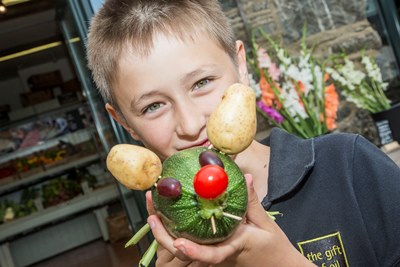 Bodnant Weksh Food Childrens Festival. Max Bianchi, 10 with a vegetable animal he made.