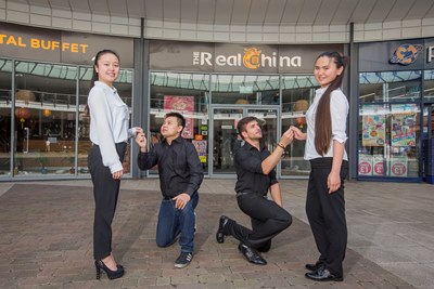 Real China, Eagles Meadow, Wrxeham. Romance at Real China, From left, Chun Wu and Zhenhua Lv with Nagy Istvan Tibor and Qiong Liu.