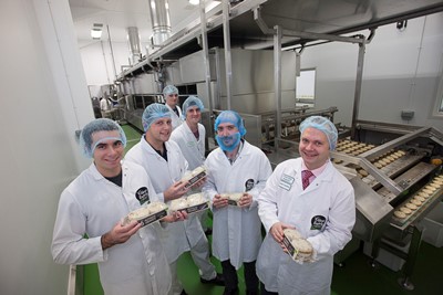 Village Bakery Wrexham, new production line producing Crumpets. Pictured (Front L/R) is David DaCosta, Dan Reddin,Chris Foxall, Simon Thorpe Operations Manager , Tom Breeze and Craig Herling.