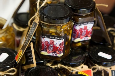 Ysgol San Sior pupils Bodnant Welsh Food, with chutney they have made. Teacher