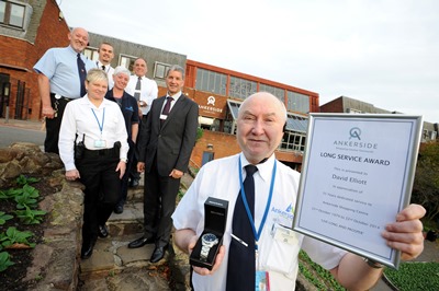 Ankerside Shopping Centre security guard David Elliott is marking 35 years working at the Tamworth centre ? he worked there while it was still a building site. Pictured David Elliott (right) with centre manager Pete Barber (centre), and colleagues Jeff Wigley, Graham Robinson, Chris Bates, Lucy Armstrong, Gill Jones
