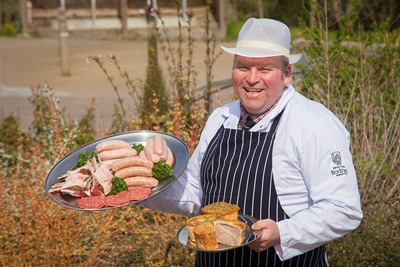 Bodnant Welsh Food wins gold and silver medals at the Welsh Excellence in Meat Awards. Pictured is Bodnant Butcher Jason Frasor with some of the winning produce.