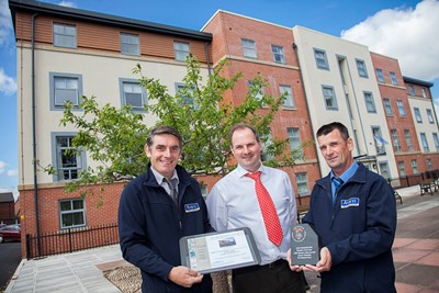 Anwyl Construction Building Awards for Centenary House Flint. Pictured are Dave Bradley Site supervisor of the year,Tom Anwyl and Steve Parry Manager of the year.